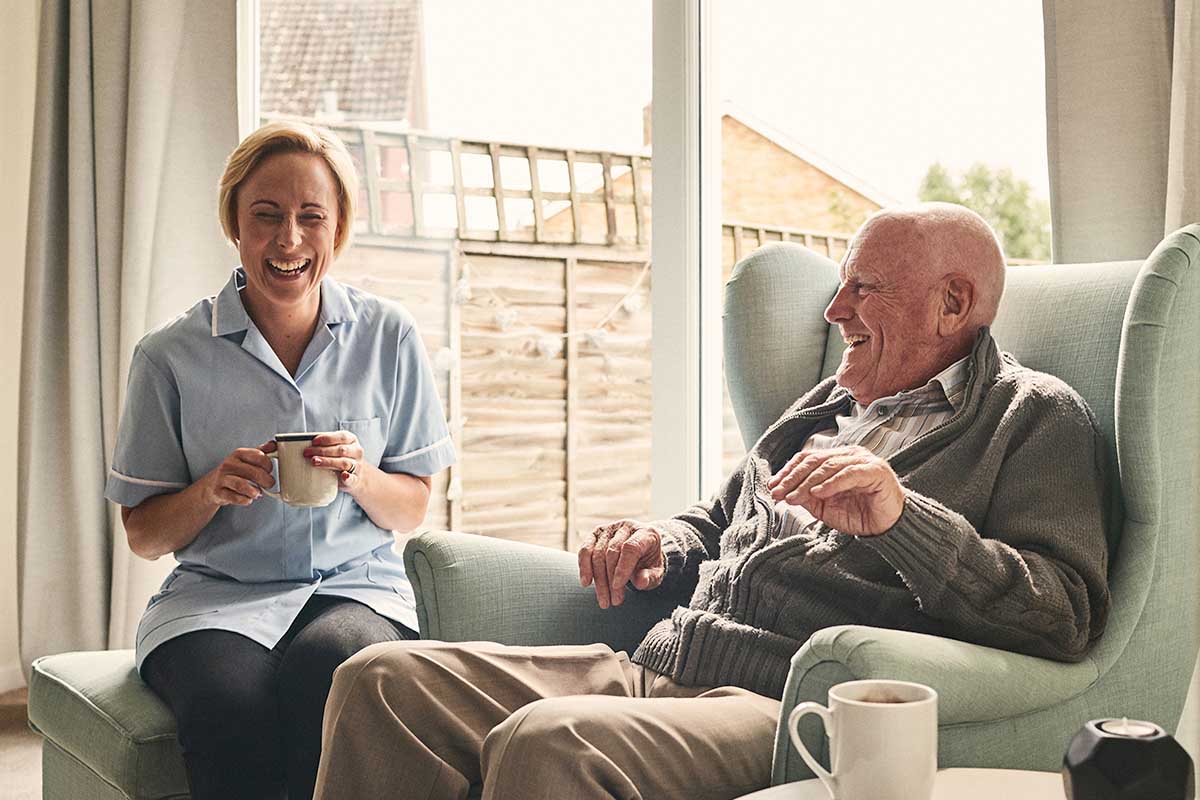 Worker and client laughing